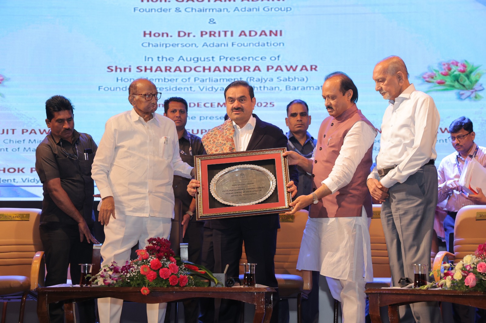 Dignitaries felicitated on stage at the college